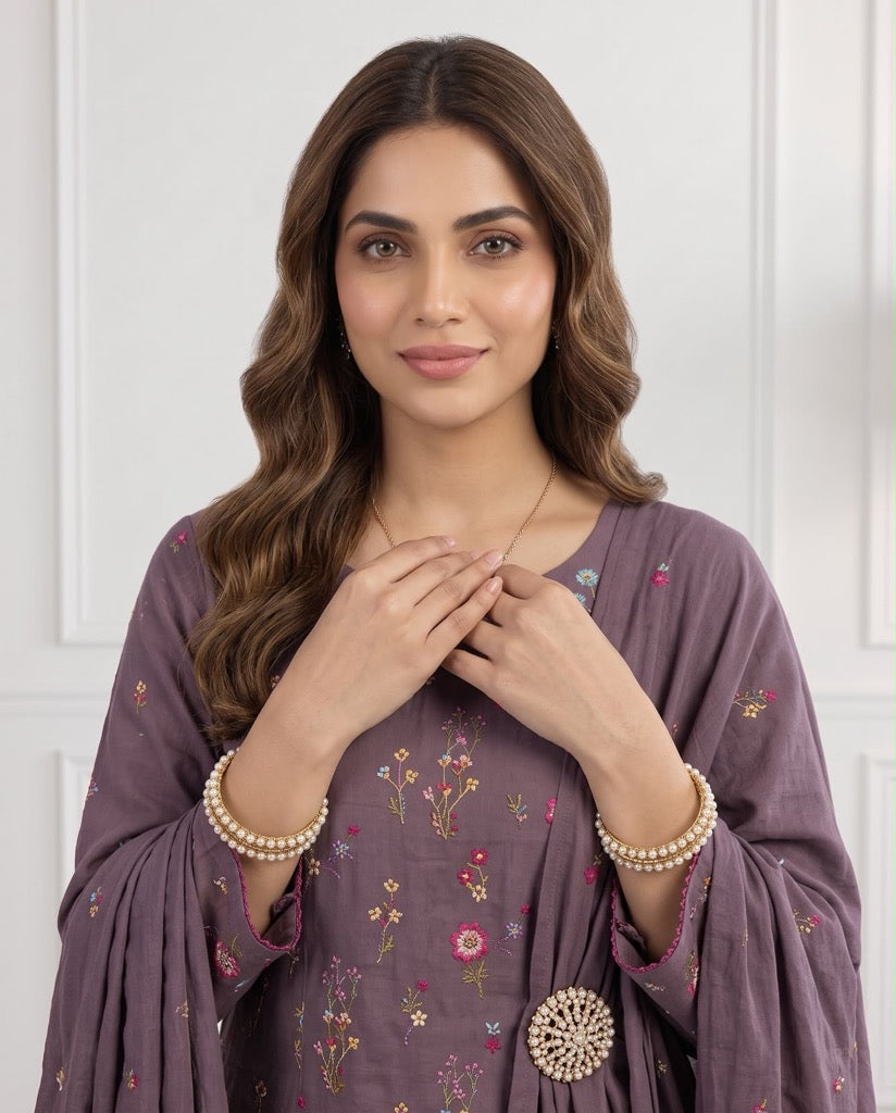 Beautiful mauve purple premium Airjet Dhanak unstitched suit featuring delicate floral embroidery from Aneela's Winter Collection.
