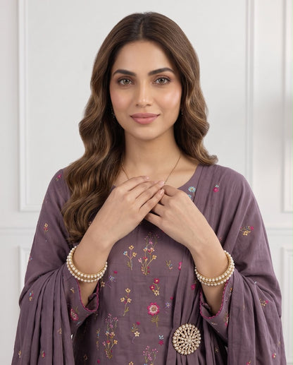 Beautiful mauve purple premium Airjet Dhanak unstitched suit featuring delicate floral embroidery from Aneela's Winter Collection.