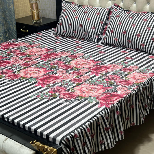 Floral and stripe printed frill bedsheet king size with matching pillow covers on a bed