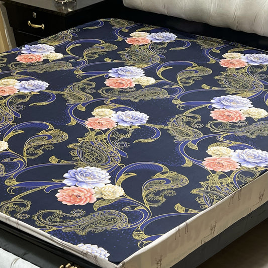 Printed floral waterproof mattress cover queen size with fitted elastic spread neatly on a luxury bed.