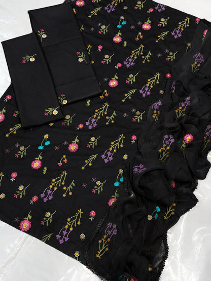 Close-up view of front embroidery and four-side laced bamber dupatta on batik lawn suit